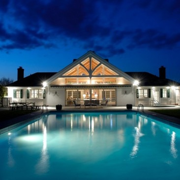 Evening view of poolhouse.